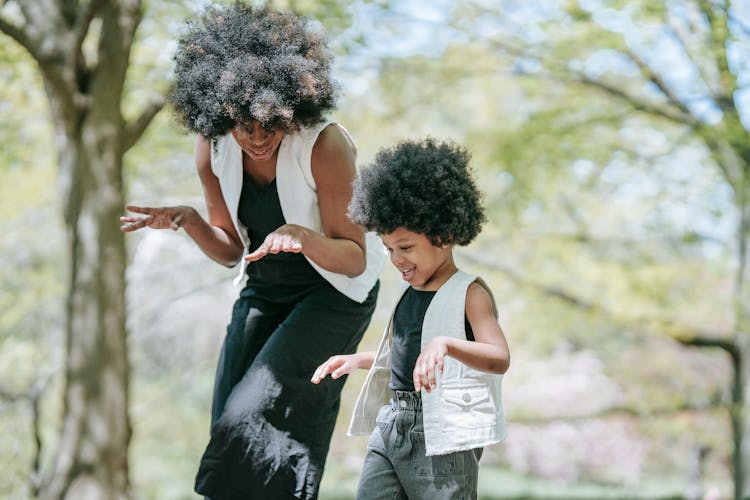 Mother And Son Dancing Together