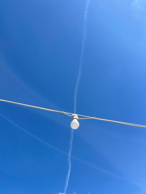 White Light Bulb Under the Blue Sky