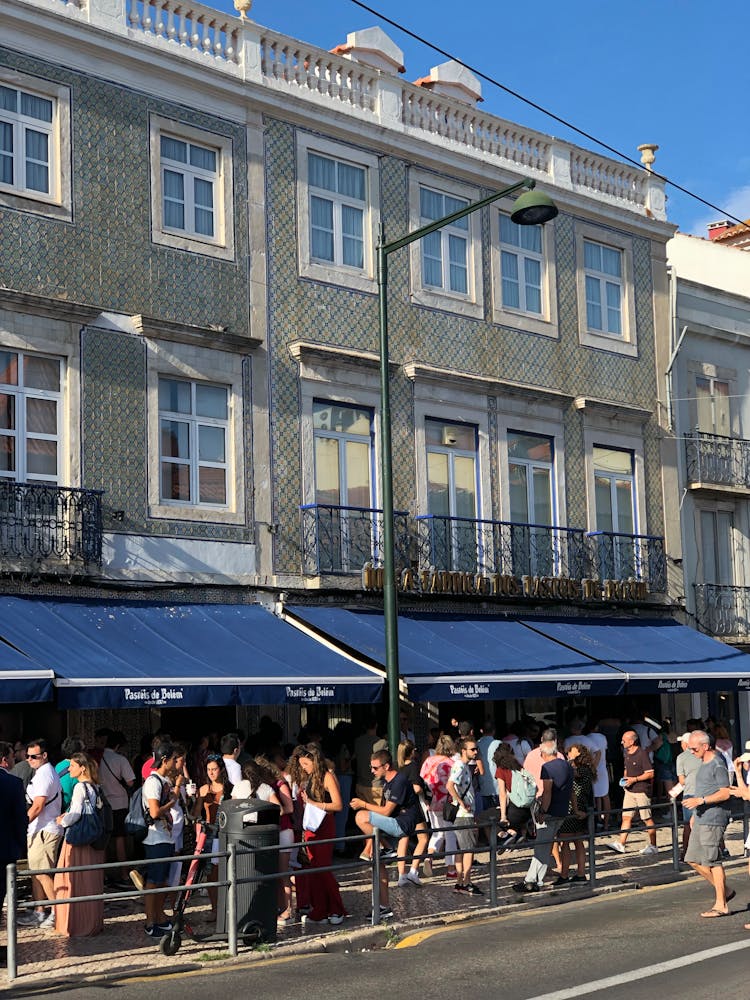 People Flocking Outside Of Pasteis De Belem