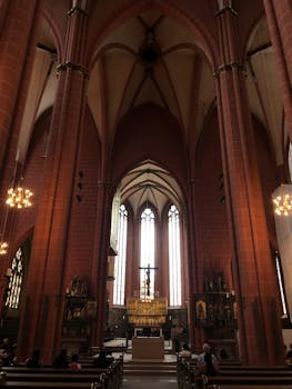 Stunning view of the Gothic architecture inside Frankfurt Cathedral, Germany.