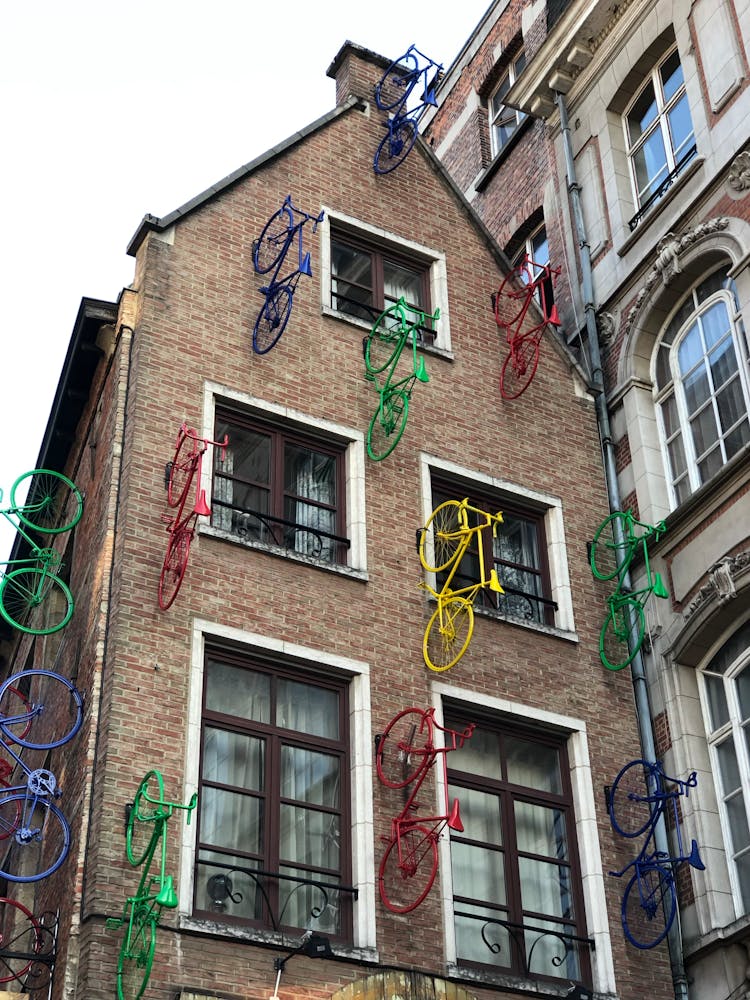 Colorful Bicycles On Buildings