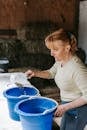 A Woman Holding a Measuring Cup