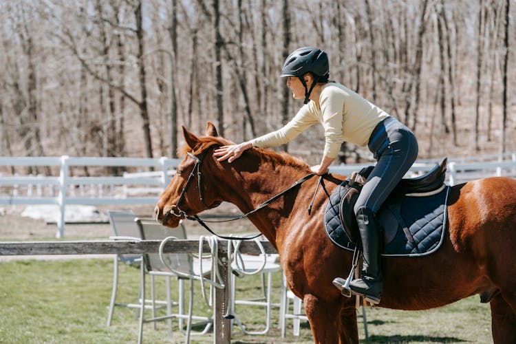 Woman Riding Horse