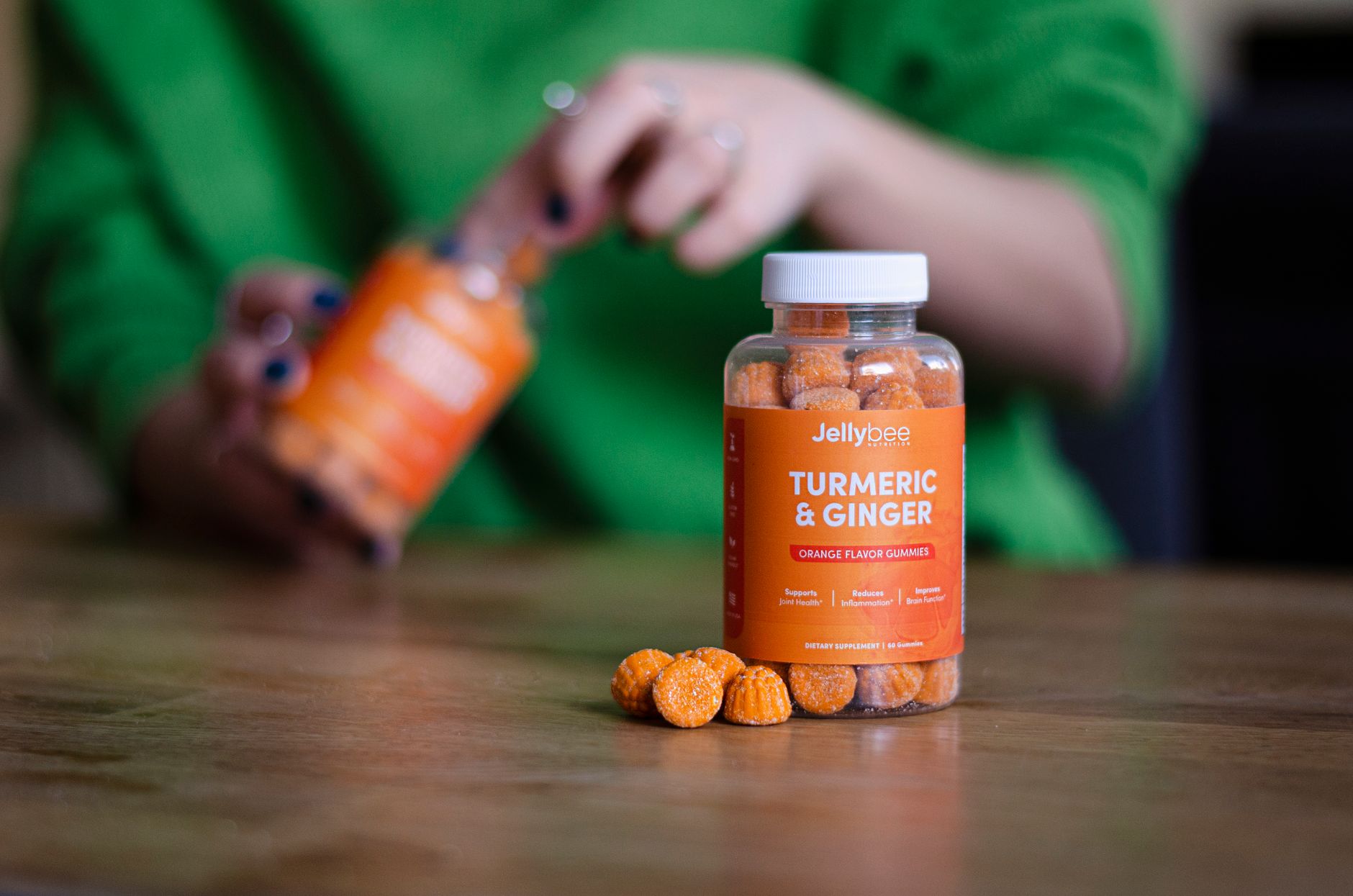 Fresh turmeric and ginger roots on wooden board