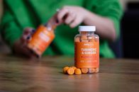 Person Holding Orange Prescription Bottle