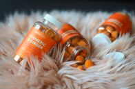 Orange and White Plastic Bottles