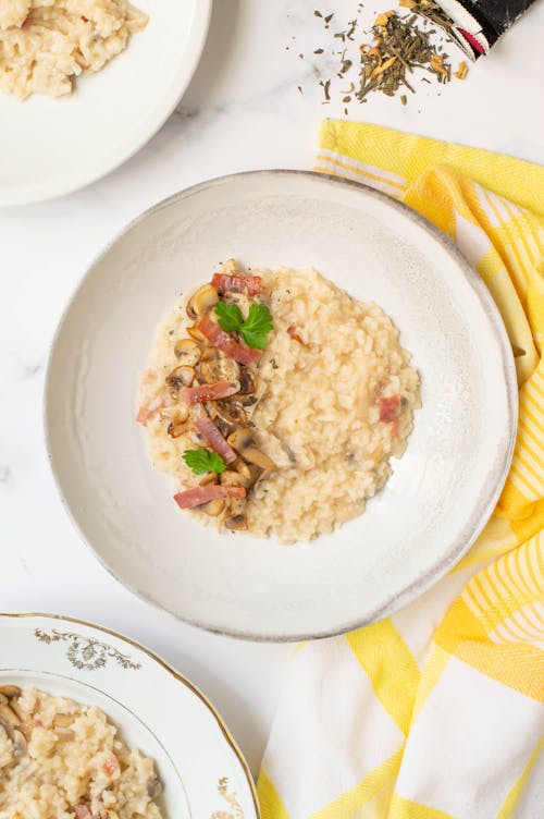 Free Close-Up Shot of a Risotto on a White Plate Stock Photo