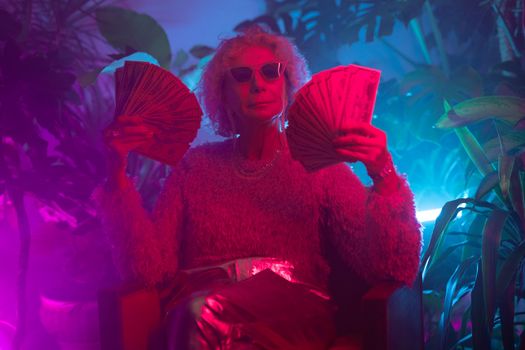 Photo of an Elderly Woman Holding Money 
