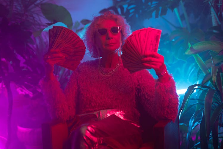 Photo Of An Elderly Woman Holding Money 