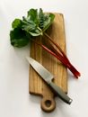 A Rhubarb on a Cutting Board