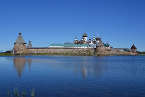 Free Stunning view of Solovetsky Monastery with clear sky reflections, showcasing historical architecture in Russia. Stock Photo
