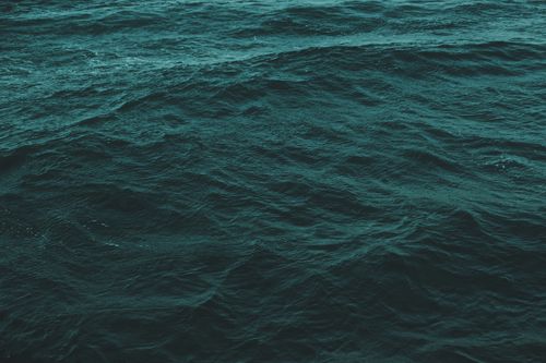 Free A serene view of lush ocean waves in Chonburi, Thailand, capturing the essence of nature's beauty. Stock Photo