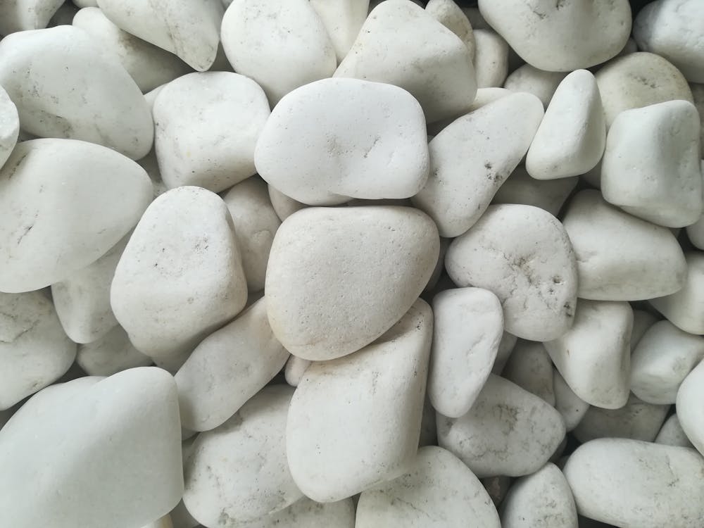 Free Close-Up Shot of White Stones Stock Photo