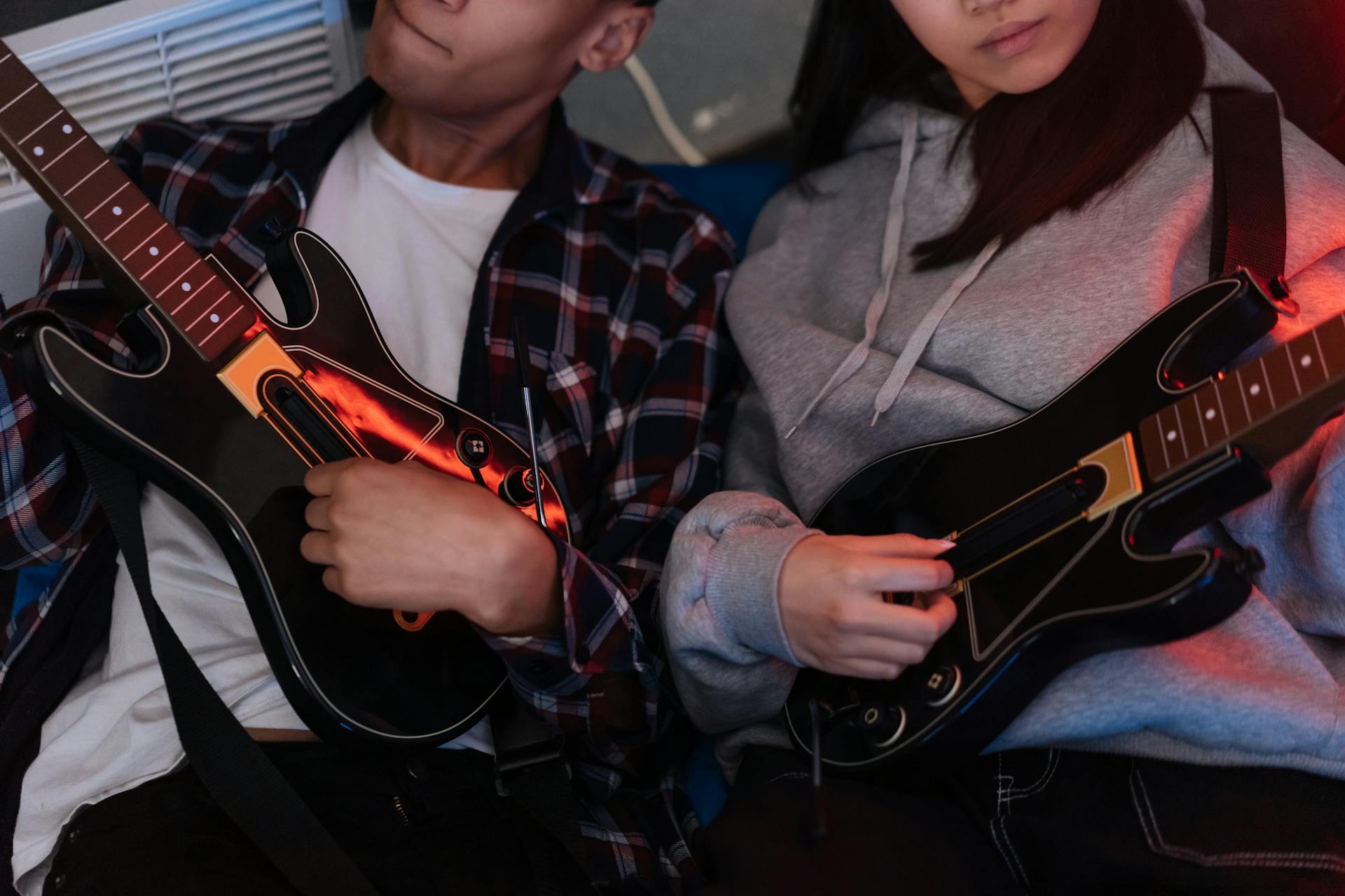 Friends Playing Guitar Hero