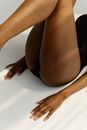 Photo of Woman's Legs Stretched Up