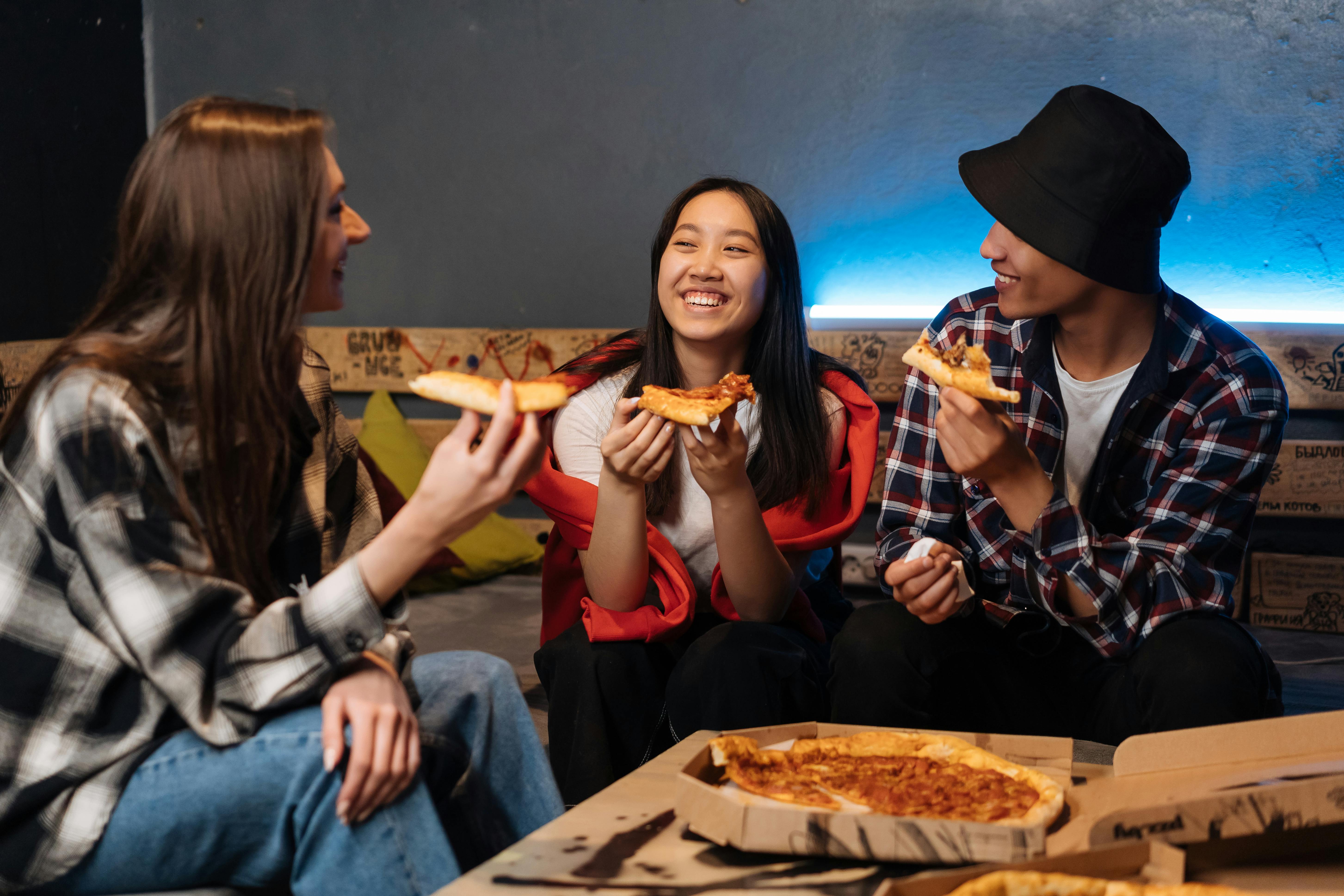 Friends Eating Pizza Image & Photo (Free Trial)