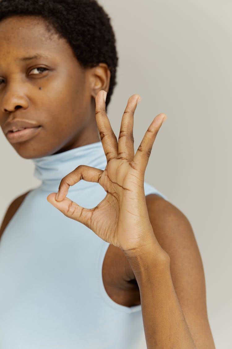 Woman Doing The Okay Sign