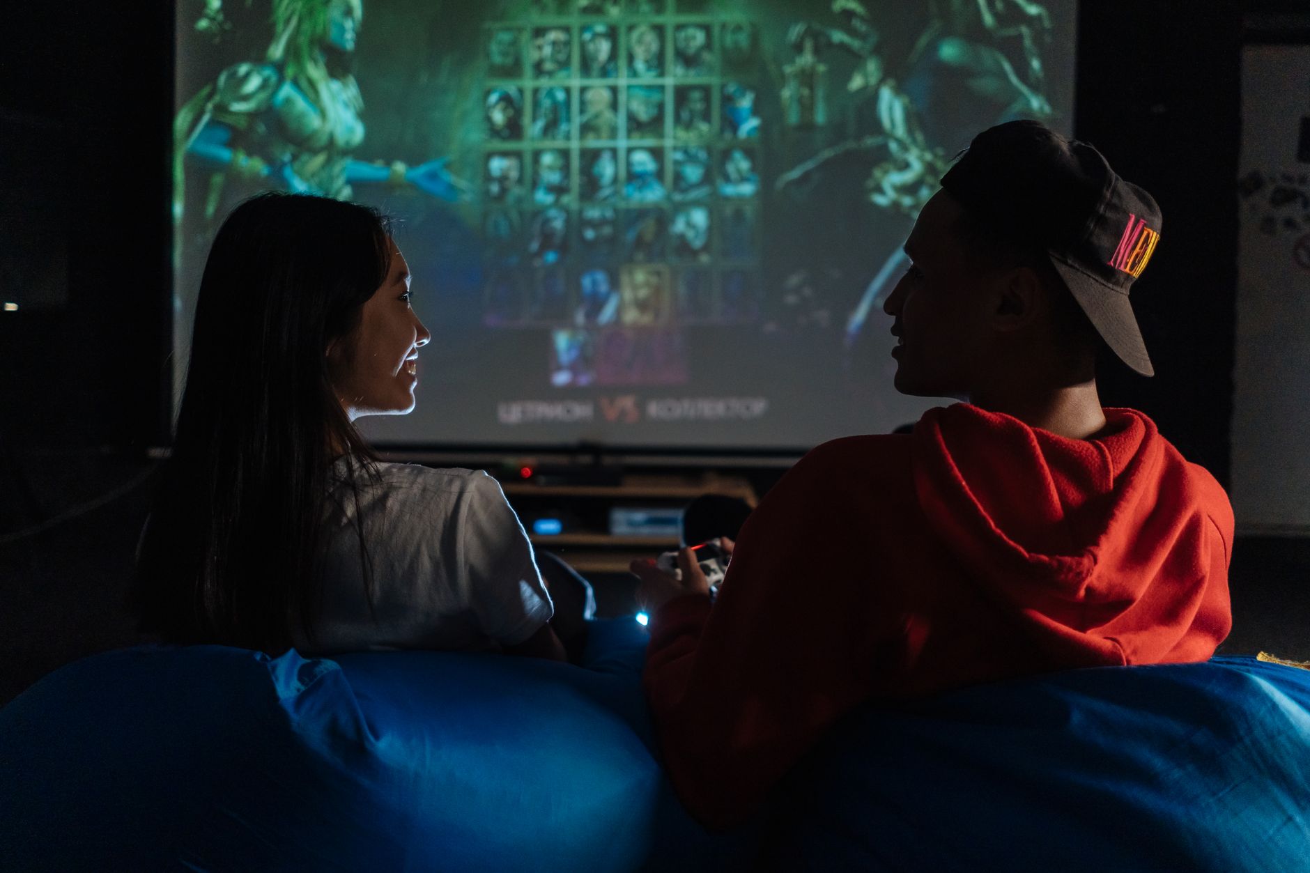 Two friends enjoy a cozy gaming night together on a video game console.
