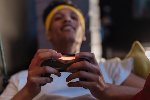 A Person Holding a Game Controller