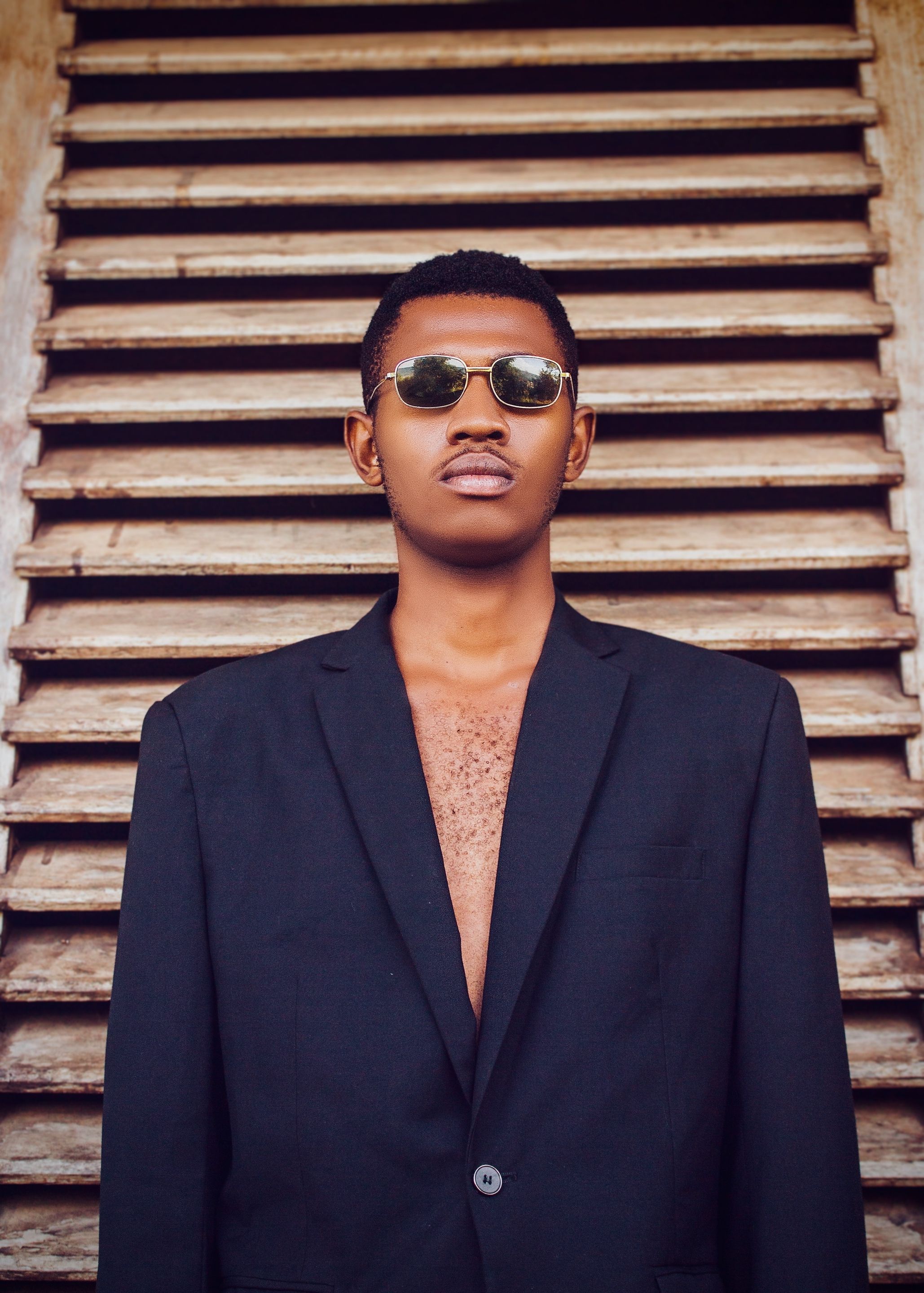 Man in Blue Suit Wearing Black Sunglasses · Free Stock Photo