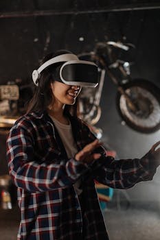 A woman wearing VR goggles immersed in a virtual reality game indoors.