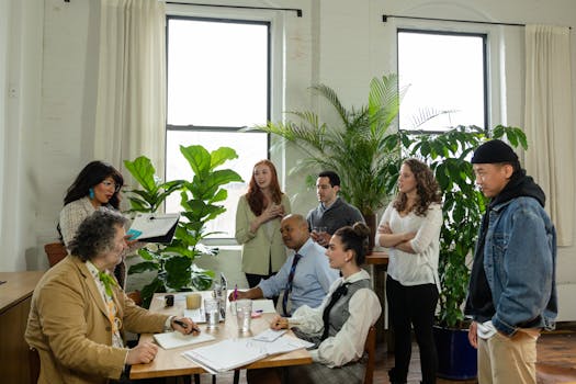 A diverse group of professionals collaborating in a modern office setting.