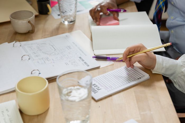 Event planning notebook with schedules and notes