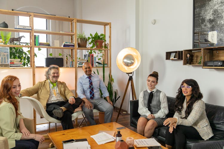 Office Workers Sitting Together