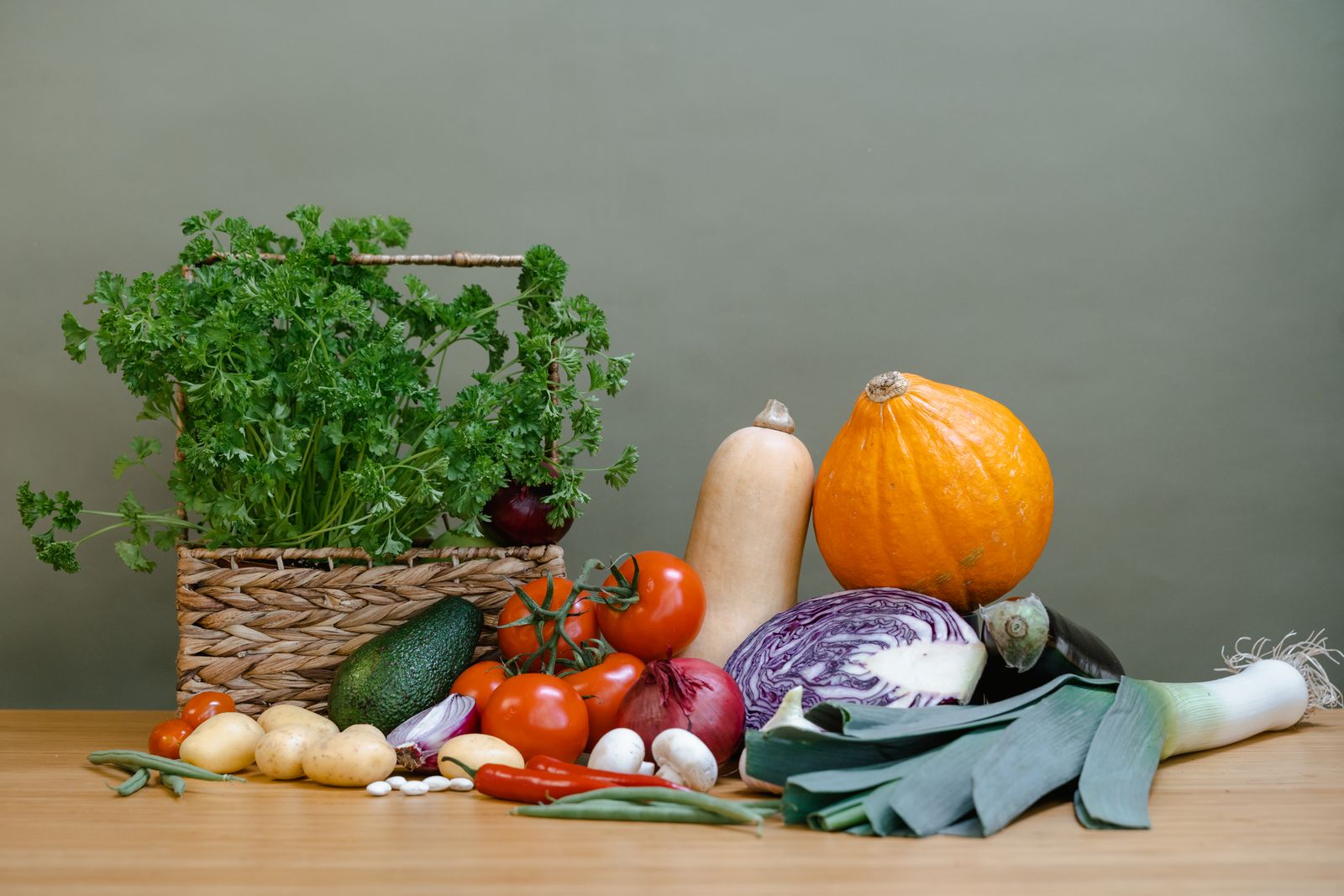 Fresh seasonal vegetables on a wooden table