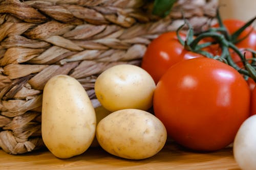 Close Up Shot of a Potatoes and Tomatoes