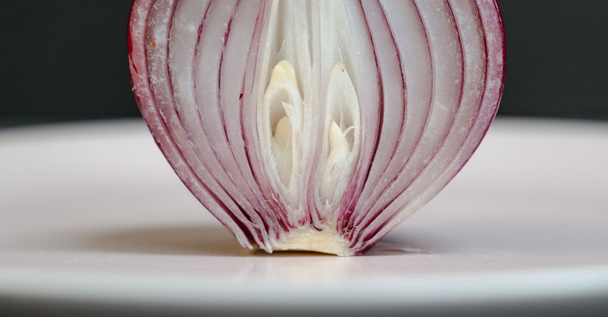 Onyon Close Up Shot of a Sliced Onion · Free Stock Photo