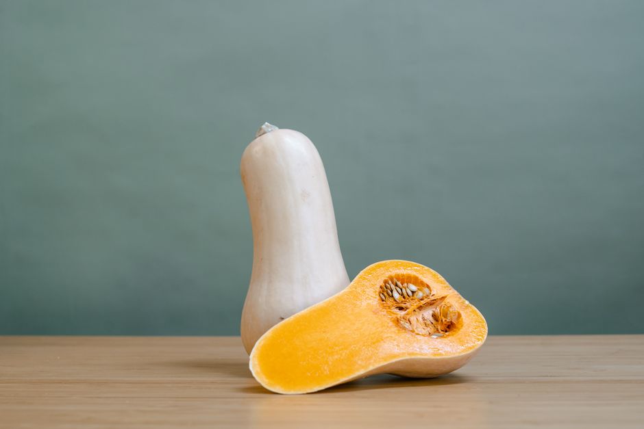 fresh butternut squash coconut milk and curry spices on a wooden table - curried butternut squash soup vegan fresh butternut squash coconut milk and curry spices on a wooden table - curried butternut squash soup vegan