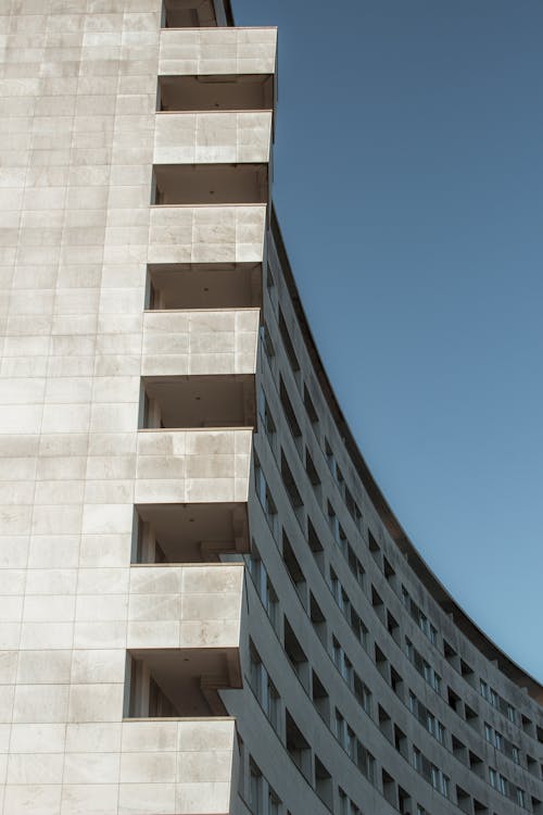 Free Low Angle Shot of a Concrete Building  Stock Photo