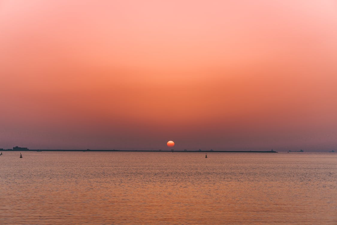 Scenic View of a Placid Sea during Sunset