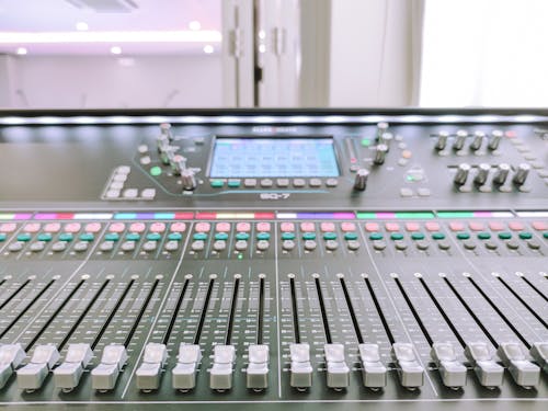 A Close-Up Shot of a Digital Mixer