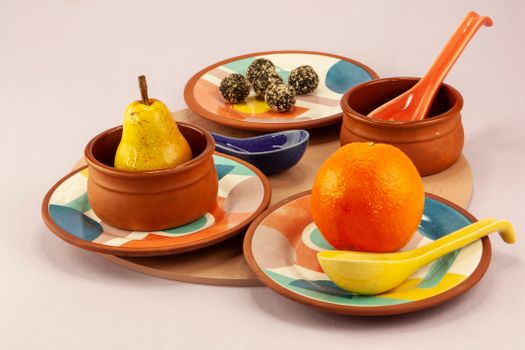 Orange Fruit on White and Red Ceramic Plate
