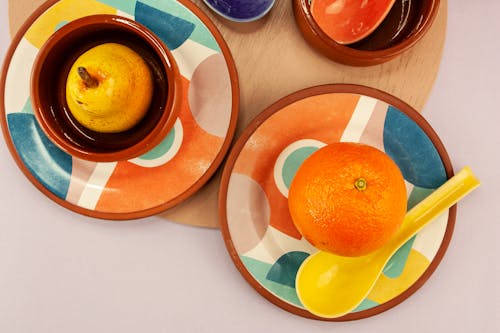 Free Photo of an Orange and a Pear  Stock Photo