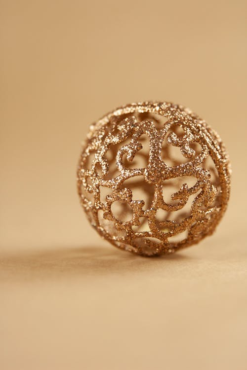 Intricate Design of a Gold Christmas Bauble