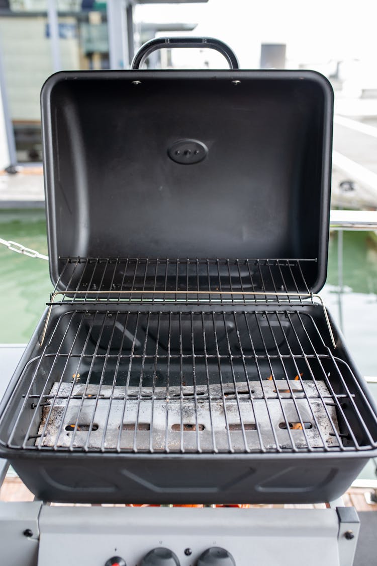 Empty Barbecue Grill Standing In The Backyard