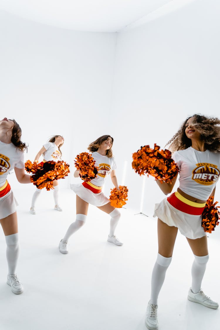 Cheerleaders Dancing Inside The Studio