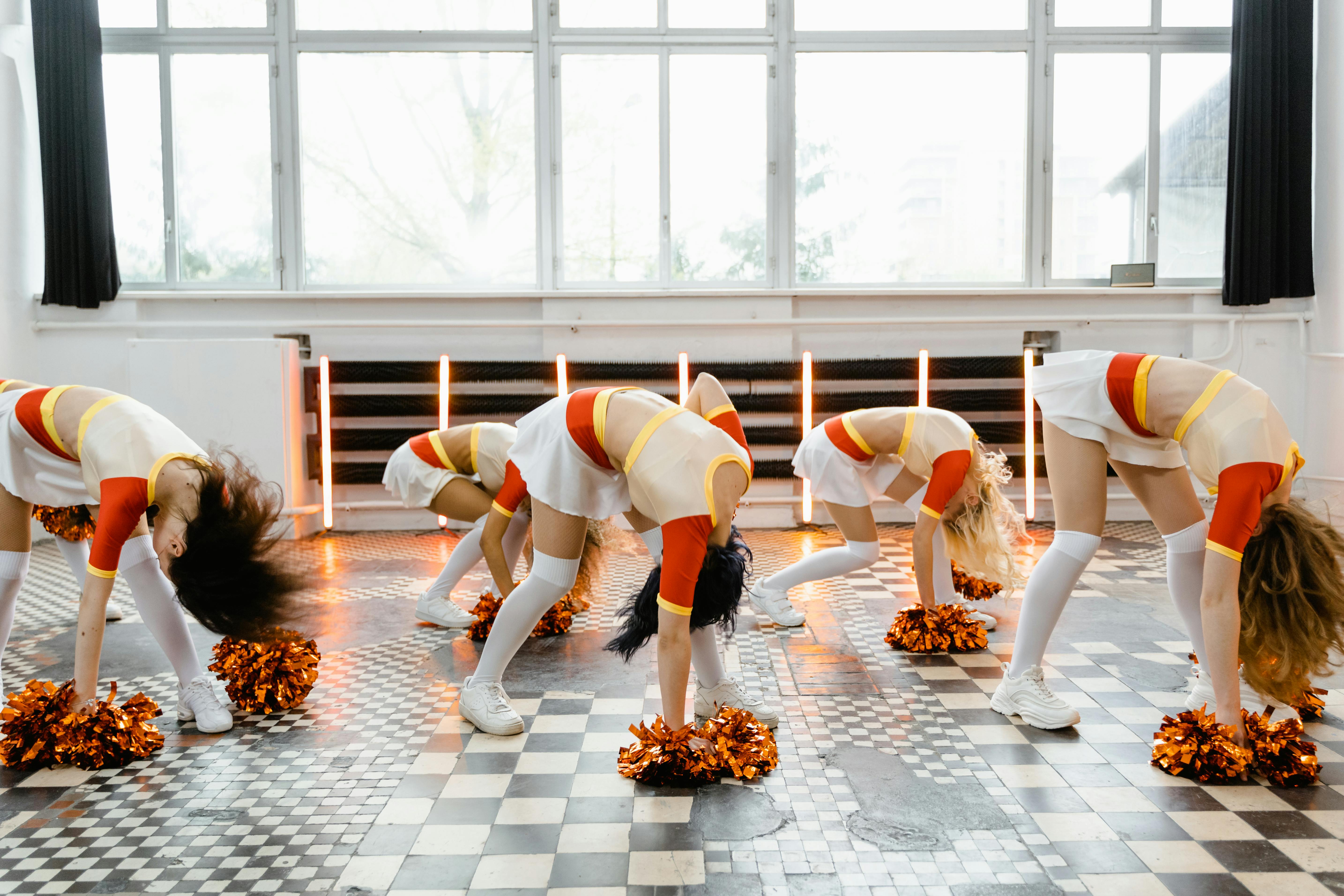 Cheerleaders Formation on the Grass Editorial Stock Image - Image of happy,  background: 129081264