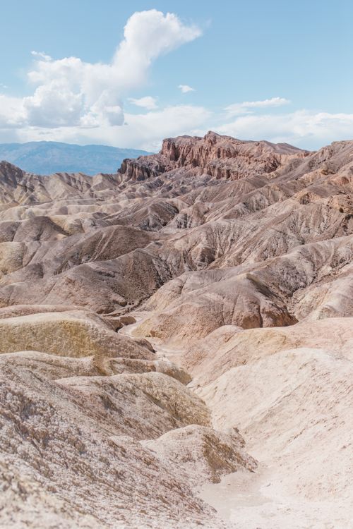 Free Breathtaking view of a rocky desert landscape under a clear blue sky, perfect for nature enthusiasts. Stock Photo