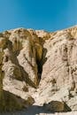 Brown Rocky Mountain Under Blue Sky