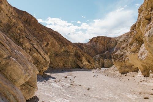 A Brown Rocky Mountain Under the Blue Sky