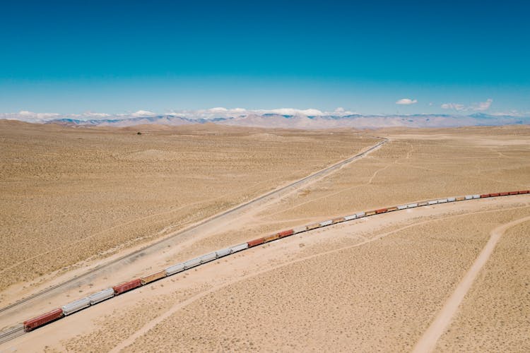 Train On Railroad On Desert 