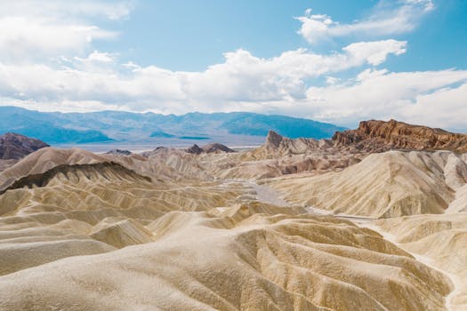 Stunning arid landscape of Death Valley with rugged hills and vast desert views.