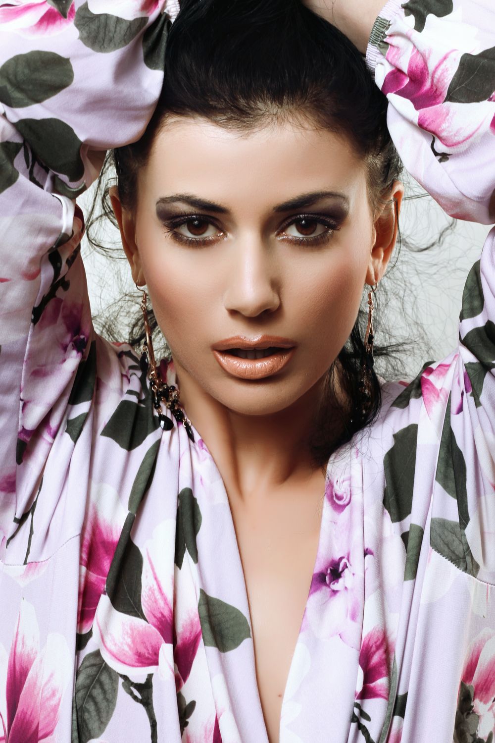 Woman in Floral Top · Free Stock Photo