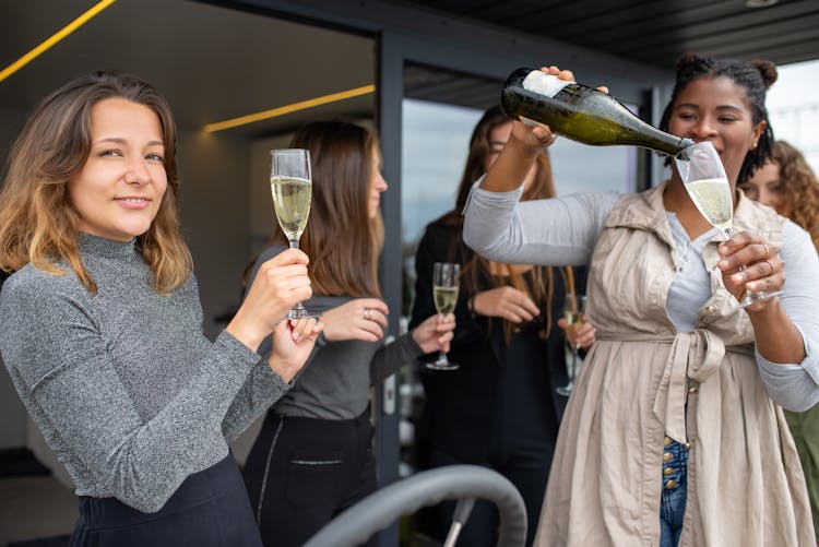 Smiling Women With Champagne