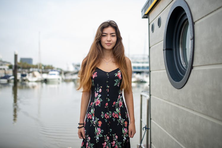 Woman With Long Hair Wearing A Floral Print Dress