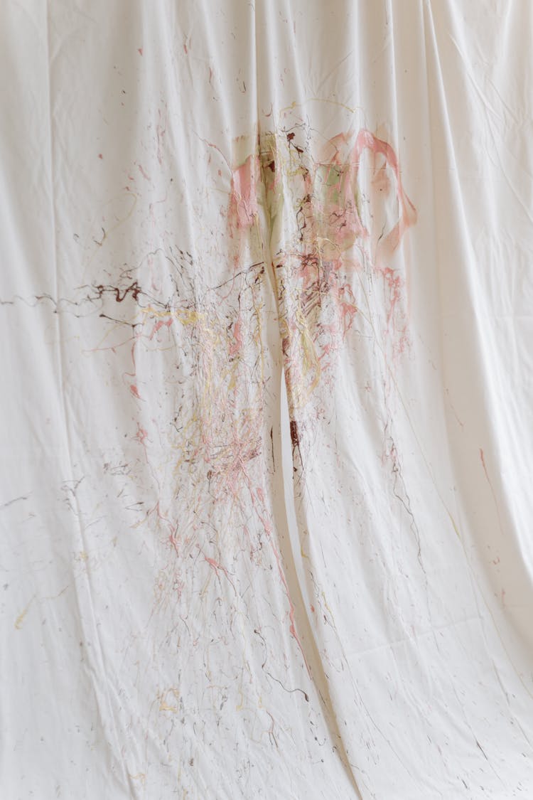 A Paint Splatter On A White Cloth